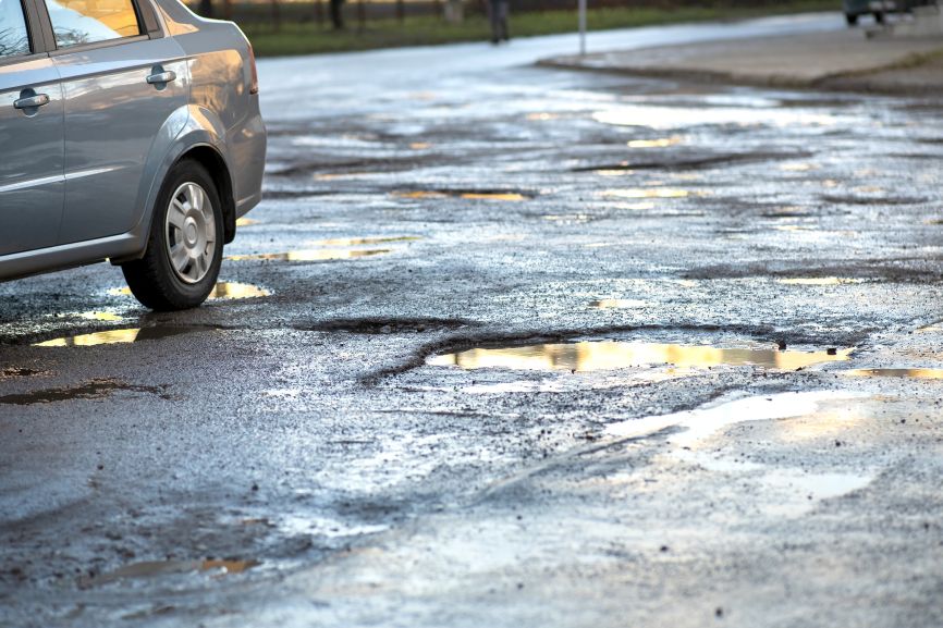 pothole tyre and wheel alignment damage on london roads